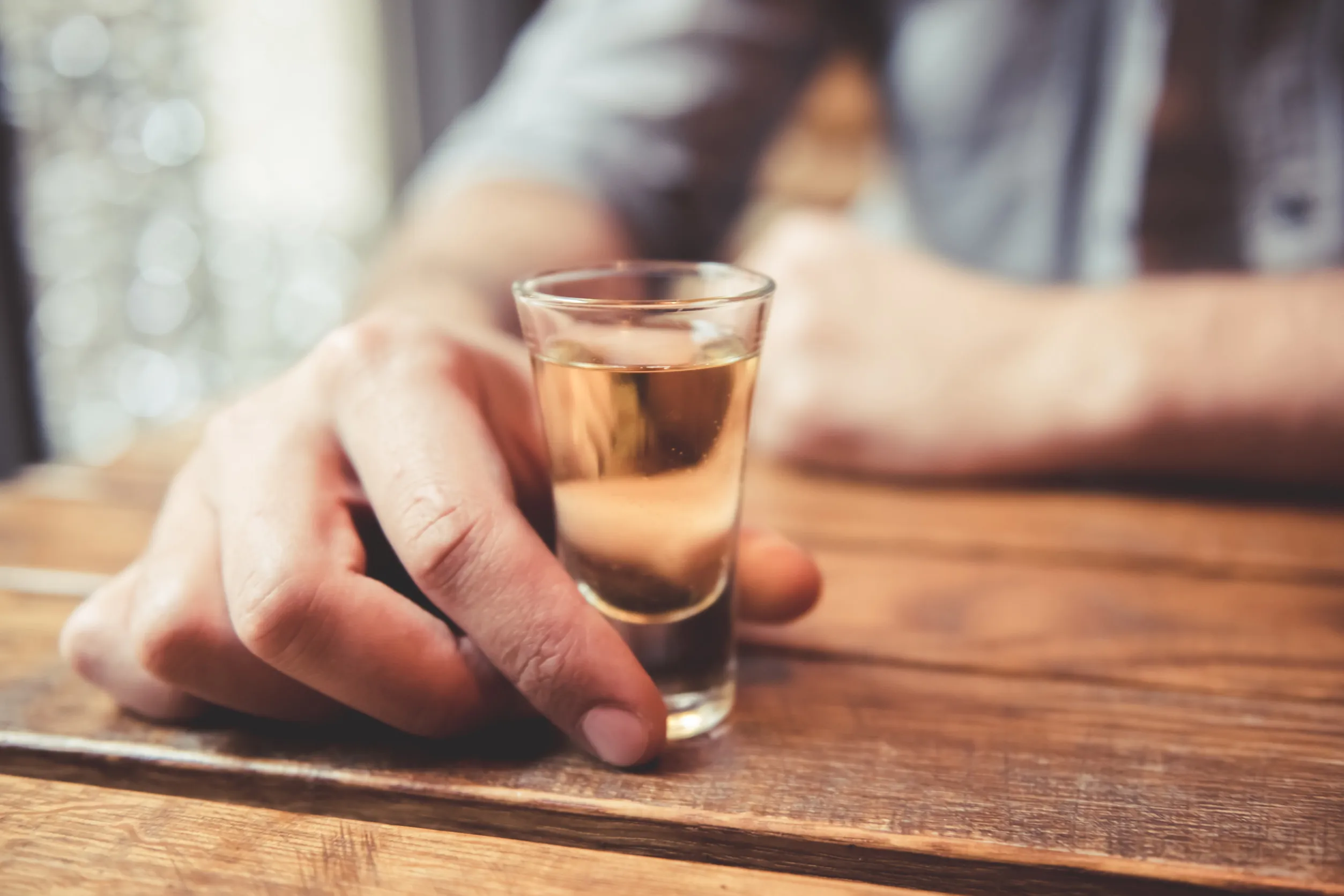 shot of alcohol alcoholic drinking a shot